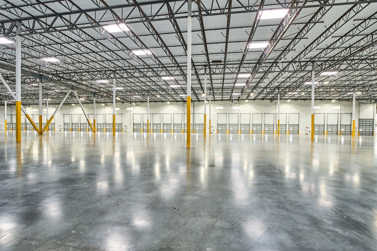 High-clear warehouse interior with column grid at 9615 Norwalk Blvd