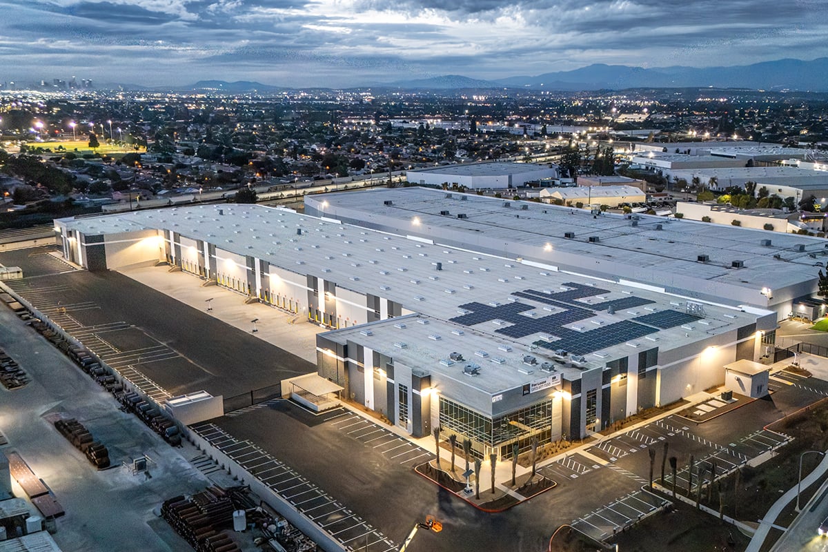 Aerial view of the industrial property at 9615 Norwalk Blvd in Santa Fe Springs at dusk